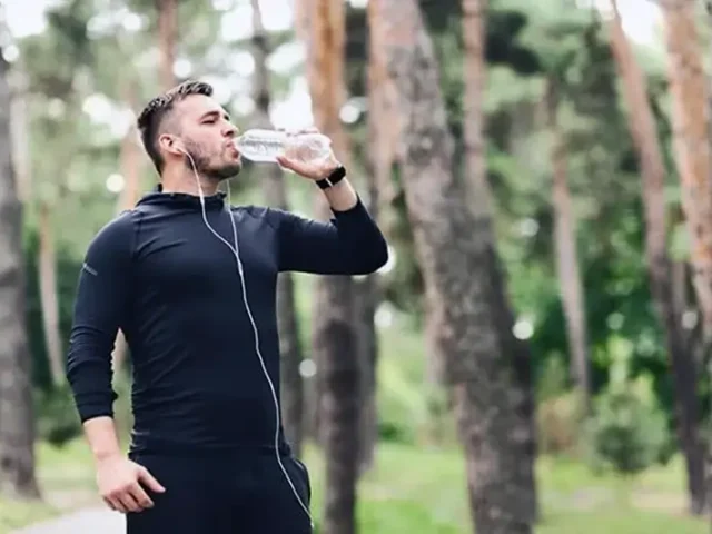 Man benefiting from drinking water and staying hydrated