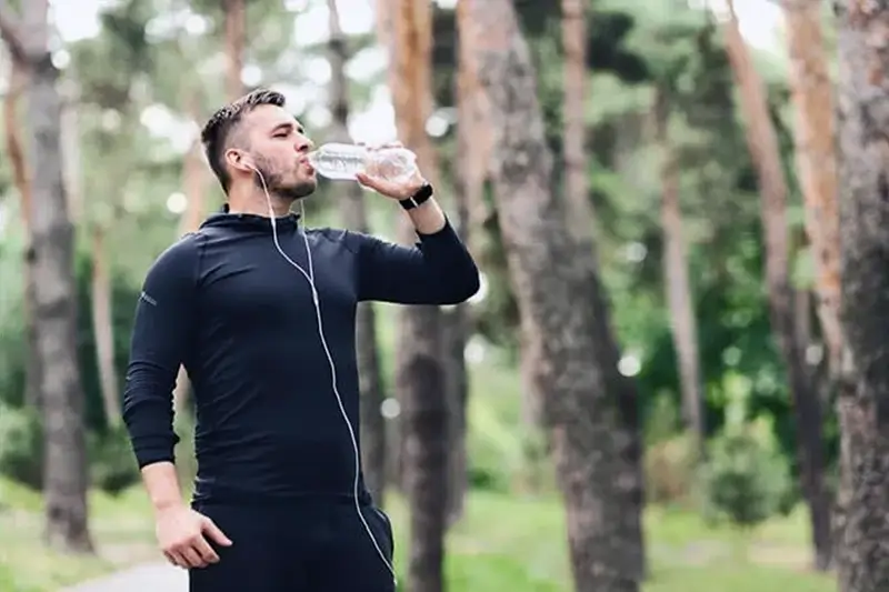 Man benefiting from drinking water and staying hydrated